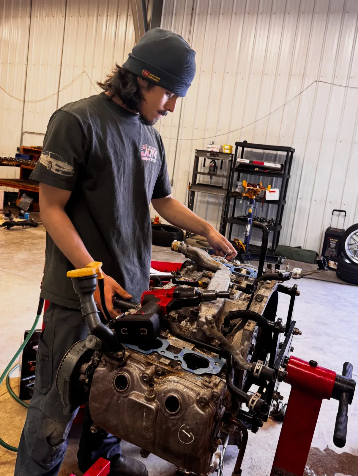 Subaru boxer engine rebuild on a stand at That JDM Shop